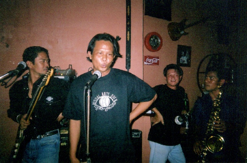 Photographer Heng Sinith and Theary Seng at Memphis Pub.